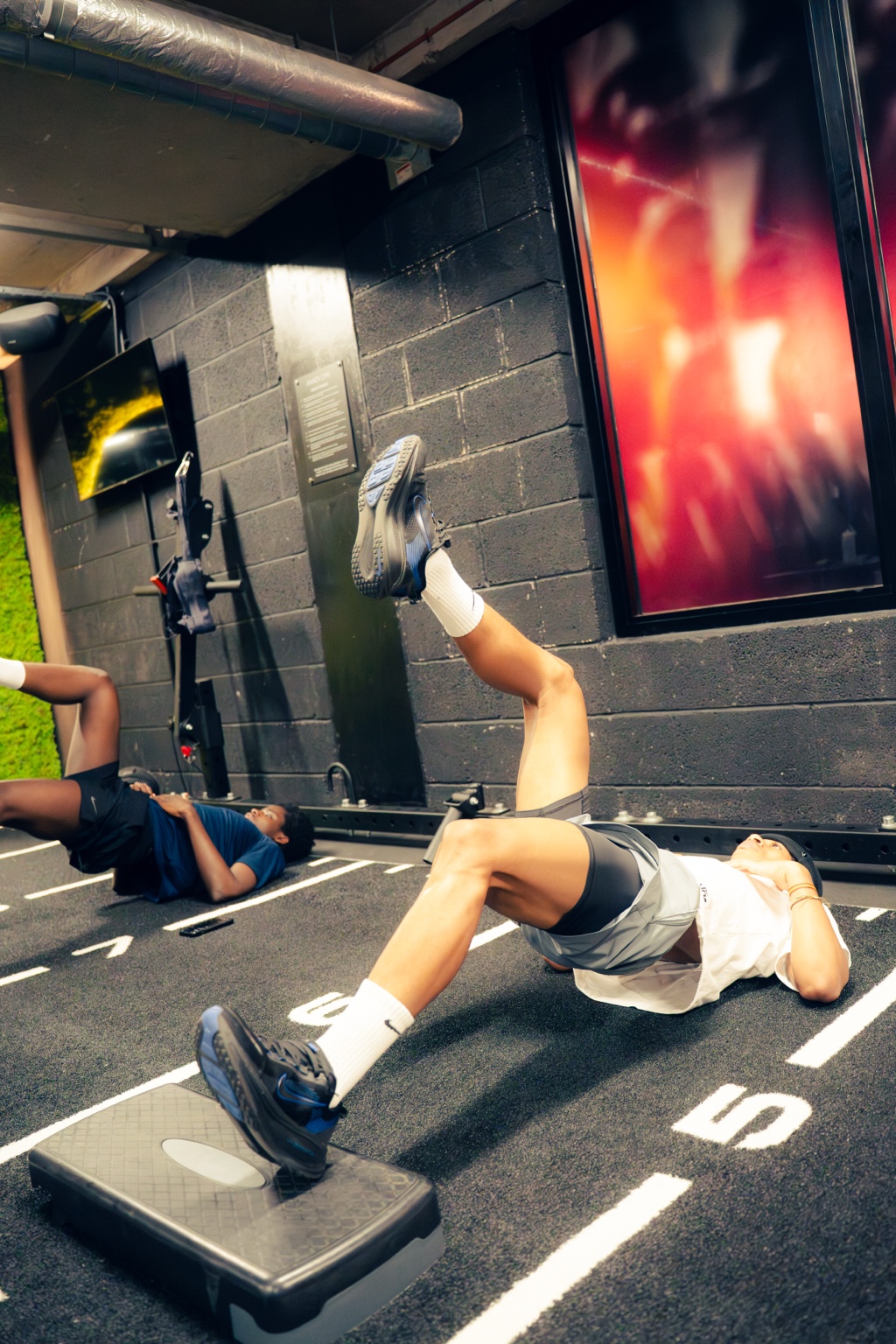 Athletes completing progressive rehabilitation work